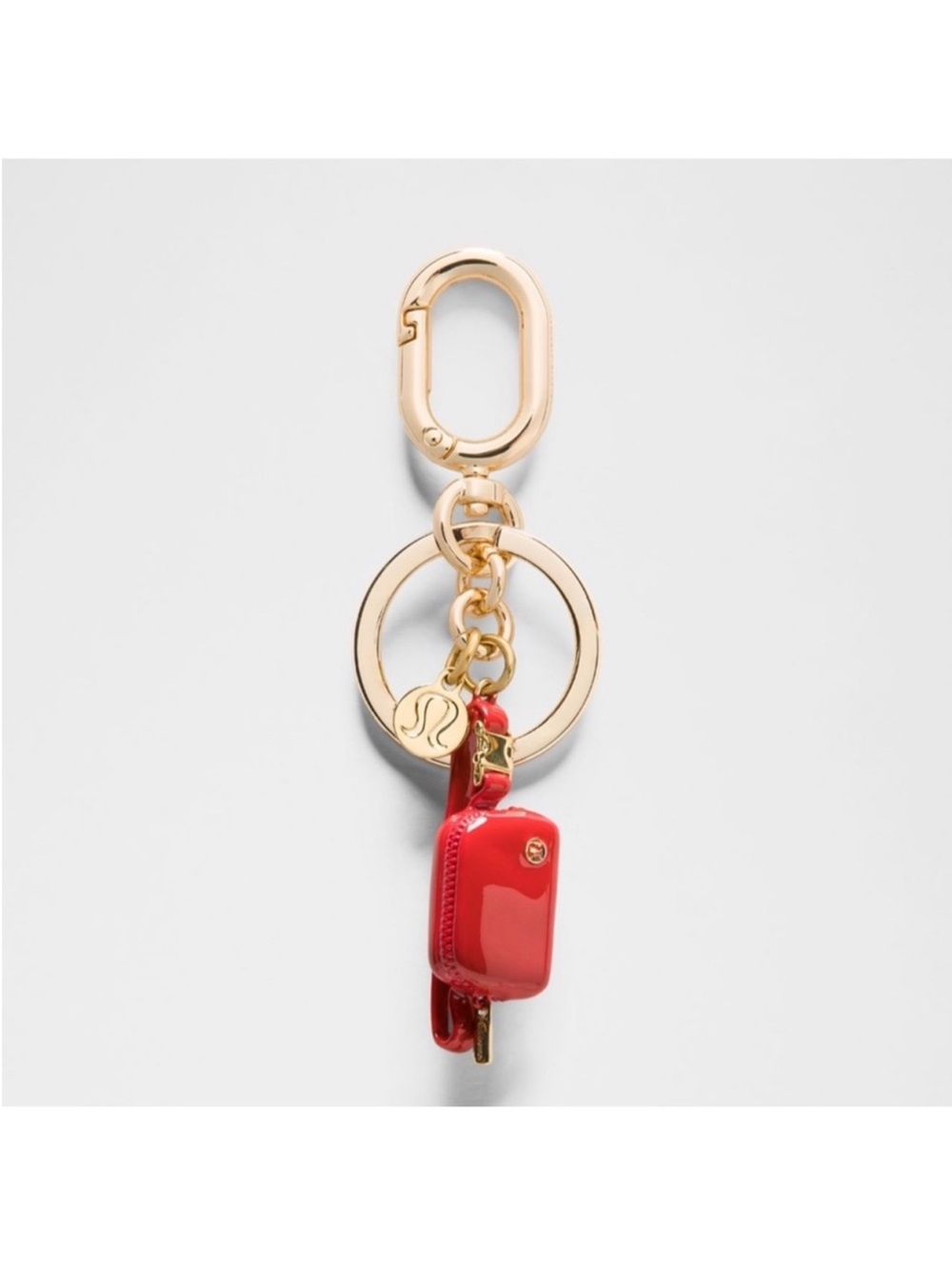 NWT Lululemon Everywhere Belt Bag Charm Keychain Lululemon Red/Gold O/S